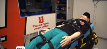 EMT Practice doll on a stretcher