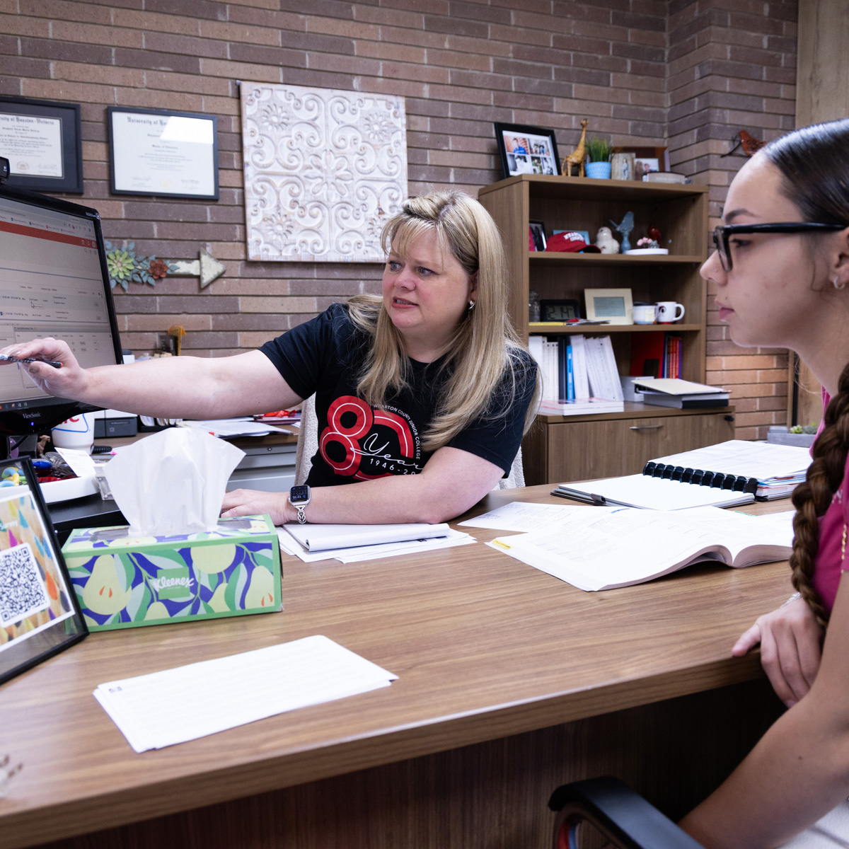 Stephanie Kolacny, Director of Academic and Career Advising, talking to a student