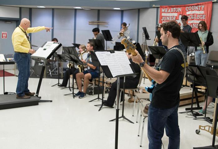 The Wharton County Junior College band rehearses for their upcoming show, 