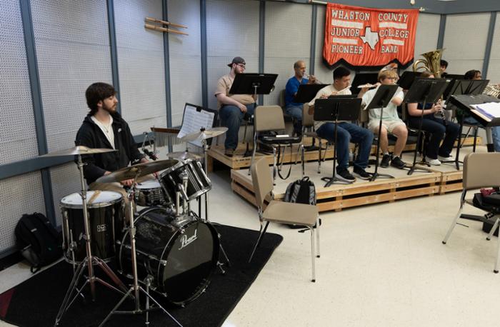 Wharton County Junior College Band members rehearse for their upcoming concert, 