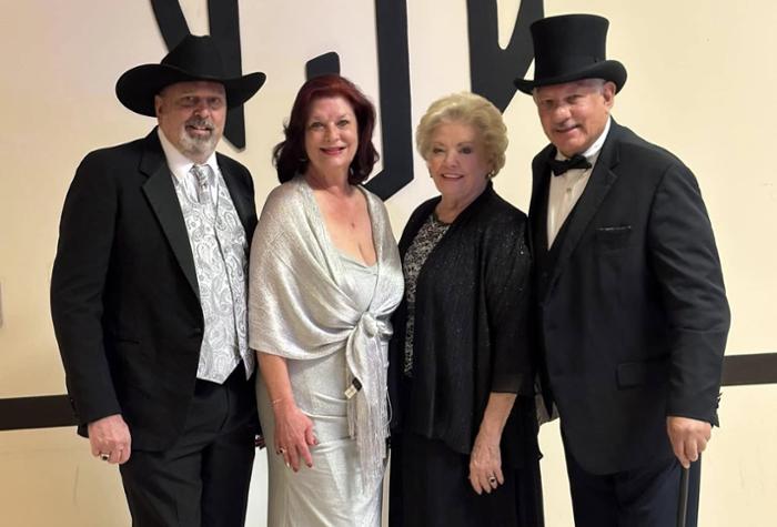 Wharton County Junior College Bay City campus specialist Gloria Crockett was recently named a Yellow Rose of Texas by Texas Governor Greg Abbott. Pictured, left to right, are Jeff Stephens, Karen Stephens, Crockett and Ray Beall.