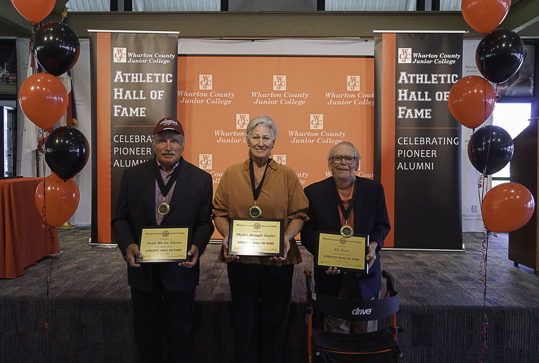 Wharton County Junior College recently held an induction ceremony for its 2024 Athletic Hall of Fame. Pictured, left to right, are recipients Juan De La Garza, Phyllis Bonugli Fowler and Ed Fiori. Not pictured are recipients Phil Blackmar and Justin Maass. 