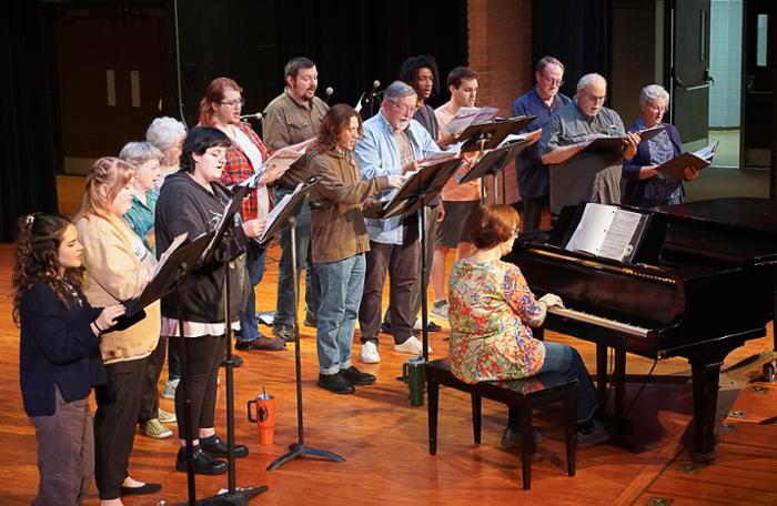 The Wharton County Junior College Choir and the Wharton Community Chorus rehearse for the upcoming concert, 