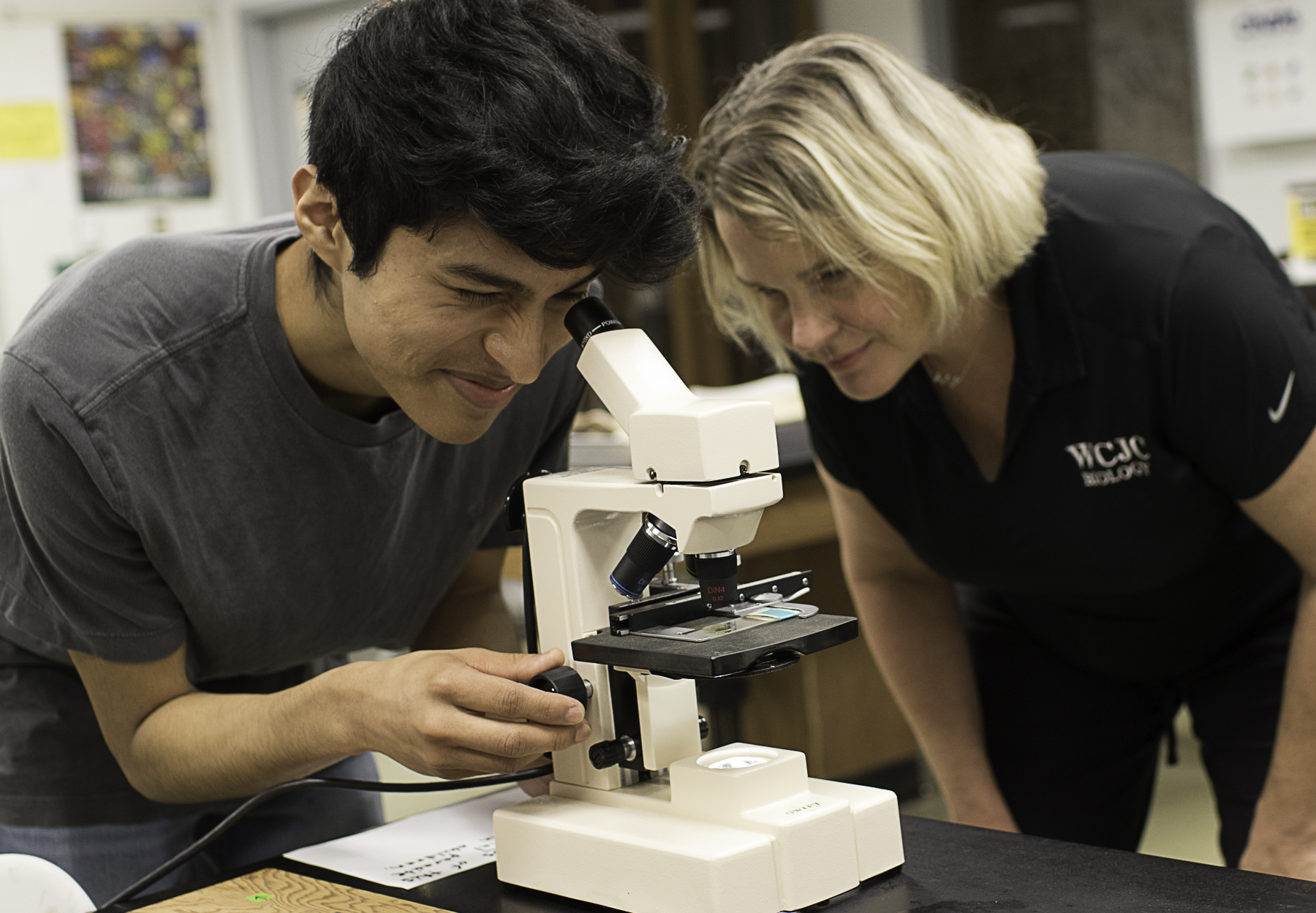 Beginning for the Fall 2025 semester, Wharton County Junior College’s core curriculum will no longer require science labs. Science labs remain a requirement for science-related majors but not for non-science majors. Pictured is WCJC student Philip Salinas of Wallis utilizing a microscope under the guidance of WCJC Biology Department Chair Jennifer Mahlmann.