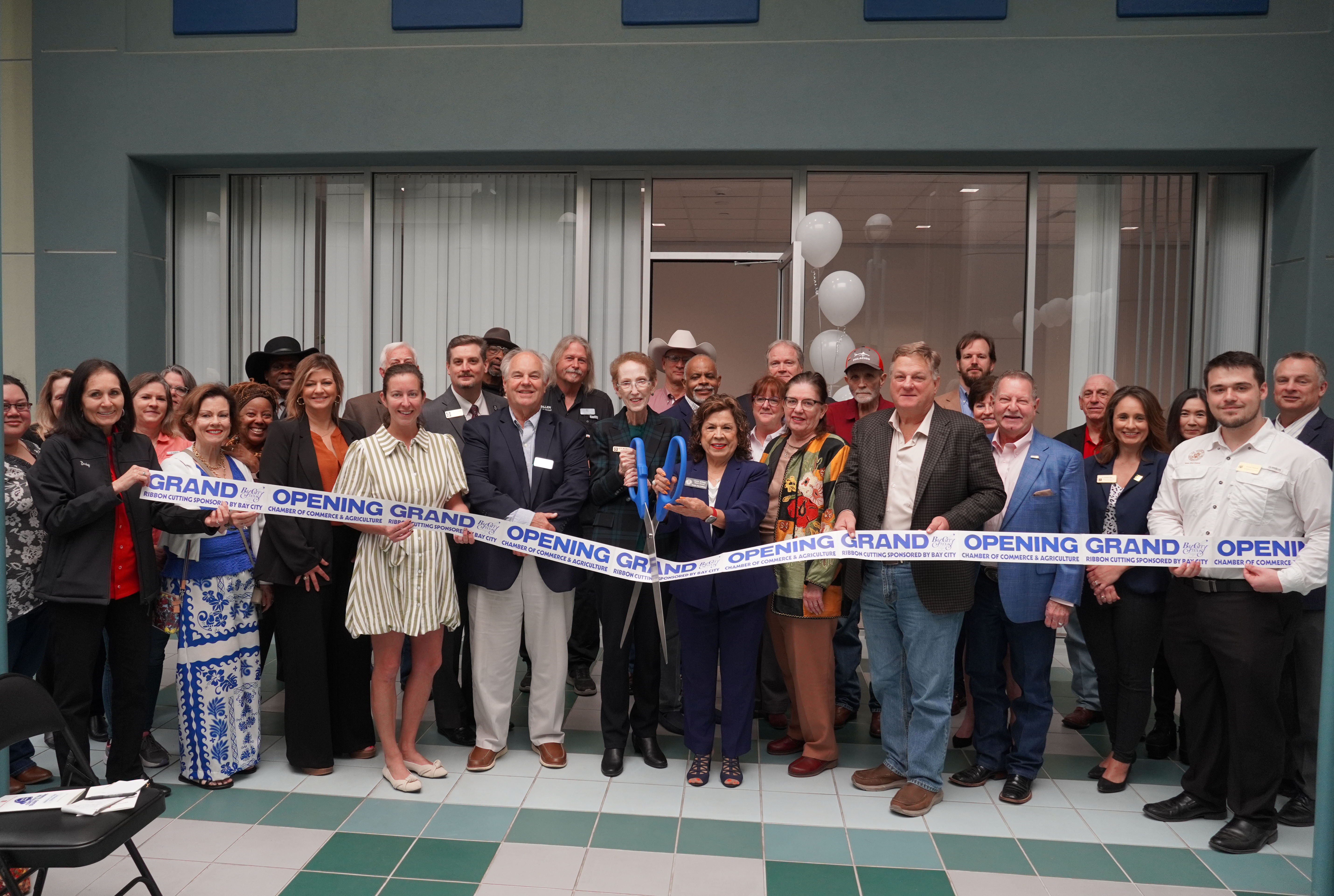 Wharton County Junior College hosted a ribbon cutting ceremony for its new construction trades training facility, located at the college's Bay City campus. On hand were elected officials, community leaders and college staff and board members. Pictured cutting the ribbon are WCJC President Betty McCrohan and Gloria Millsap, District Director for Sen. Joan Huffman.